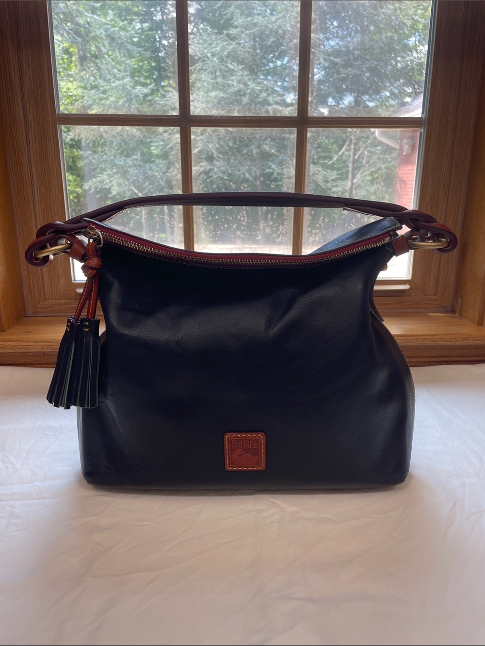 Dooney & Bourke Navy Florentine Twist Strap Hobo Brown Trim and Tassel